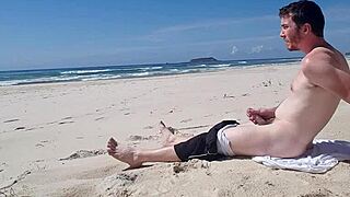 Jerking off casually at the beach with no shame