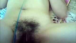 Beautiful Linh engages in suggestive web chat sex on webcam, teasing with explicit actions.