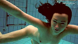 Watch Alla, The Brunette Teen, Swim Naked In The Hot Pool