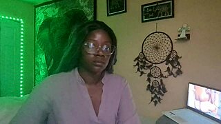 Naejae sits alone, rubbing her wet twat while watching hot lesbian porn on her screen.