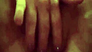 she loves massaging her big hairy pussy in solo amateur session