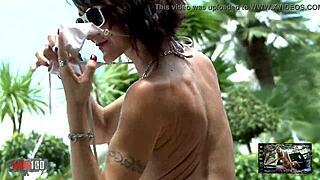 milf lyna cypher strips hot by the pool