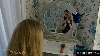 young blonde in fishnets rides her black dildo doggy style