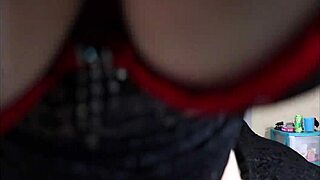 woman pleasures herself with toys in lingerie