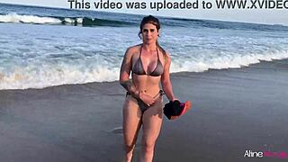 hey, wanna see this blonde beach babe bang her fan hard?