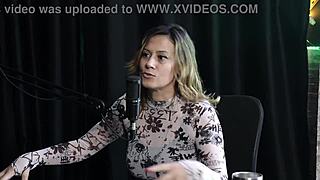 Redhead in costume shares dirty talk during intimate massage session.