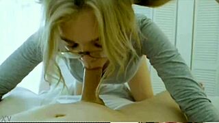Blonde woman with glasses engages in a blowjob scene in this narrative.