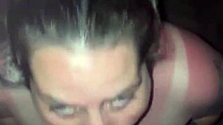 Sunburned blonde goddess with tattoos gives deepthroat blowjob in thong