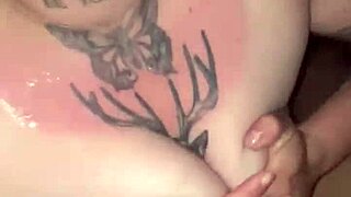 Sunburned blonde goddess with tattoos gives deepthroat blowjob in thong