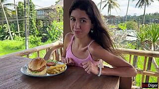Cute Girl Eats Burger with Cum on Face at Public Cafe. How Bold Is She?