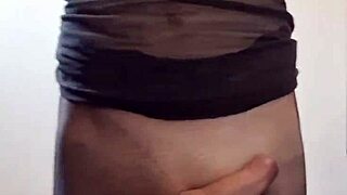 the transsexual with a monster cock strokes until he cums all over her nylon pantyhose and ass