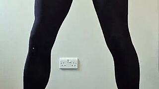 the transsexual with a monster cock strokes until he cums all over her nylon pantyhose and ass