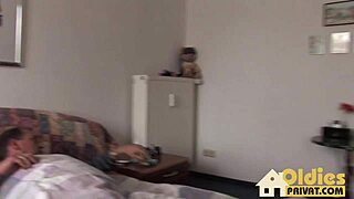 Omi, a German amateur, showcases her big tits in high definition video.