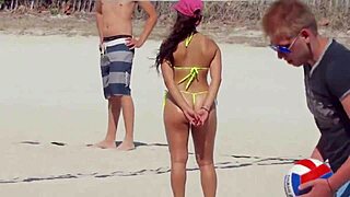 Is that micro bikini girl on beach with relatives hot?