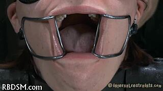 bound villein gets blowjob from femdom mistress in bdsm scene