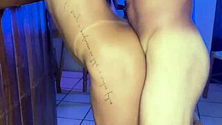 Pretty tanned girl moans loudly while fucking on stairs in heels.