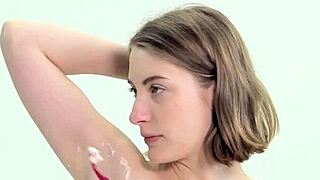 Sweet teen 18+ shaves her smooth skin with care