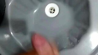 amateur guy jerks off in bathroom after soccer game