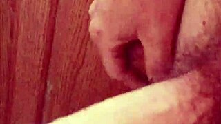 Amateur guy gets short foreskin handjob at home