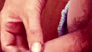 Amateur guy gets short foreskin handjob at home