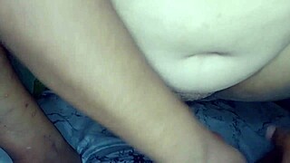 mama gordita playing with her dildo, putting it in her hairy pussy?