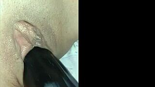 Chris Vivi shows off her big pink flower.