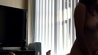 Asian with big tits rides cock hard