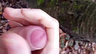 Masturbating in the forest surrounded by nature and trees