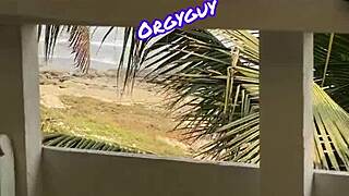 Woman flashes at beach resort outdoors