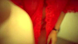 Latina in red lingerie unleashes her sensual side with huge tits.