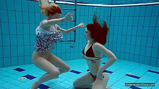 two teen blondes having sex in the pool underwater