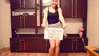 Hot secretary dances seductively in office