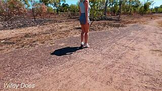 Wife takes cum on tits during public blowjob.