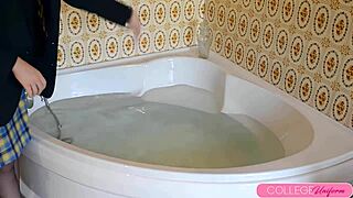 Why Not Watch Cute Sophia Smith Jump in the Bathtub Fully Dressed and Rip Clothes for Squirting Fun with Toys?