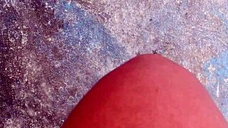 hot girl walks barefoot on beach with dirty feet soles. she shows wet foot fetish play outdoors in public