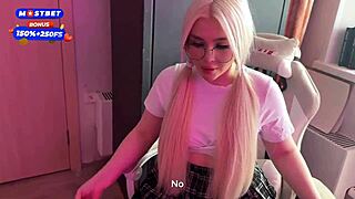 Chubby blonde teen with big tits rides gamer guy's cock in condom on webcam.