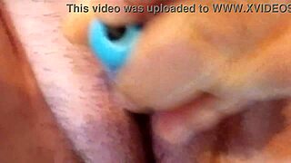 Pretty milf's tight pussy teased with vibrator in close-up