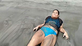 Whoa, check this curvy Latina gordita with a massive big ass shaking it on the beach, all homemade and tattooed! 🍑🏖️🔥