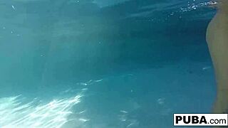 Olivia enjoys a relaxing summer day splashing around in the sunny pool