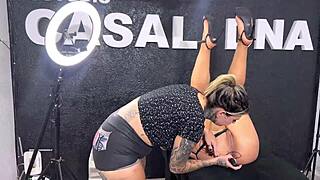 tattooed artist licks the ass of her muscular client until she moans and squirts in ecstasy