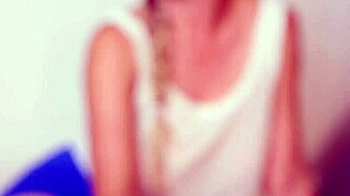 Flexible babe starts masturbating slowly on the soft couch in quiet room