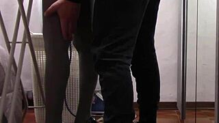 The milf with beautiful legs in pantyhose irons clothes. She gets touched gently before intimate moments.