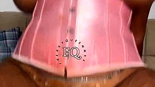 Ebony teen contrasts her big boobs while fucking herself with a huge rainbow dildo on the bed