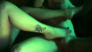 Sexy goth teen with big natural tits gives a sensual oiled footjob to her stepbrother with passion.