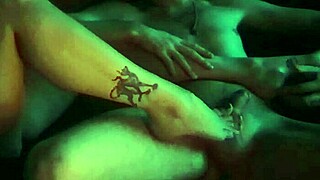 Sexy goth teen with big natural tits gives a sensual oiled footjob to her stepbrother with passion.