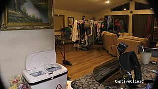 In the hospital room, a shaved nurse in latex gloves spanks the patient during a fetish backstage session. Her small tits peek out.