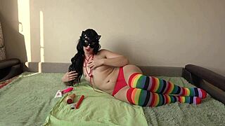 Vibrator goes in anal while panties stay in pussy with wax on body for unusual fetish.