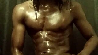 Watch This Muscular Bodybuilder With BBC Stroking His Monster Cock All Oiled Up Solo Until He Cums!