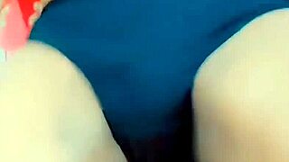 Feminine sissy in tight thong and miniskirt masturbates oiled body with small cock to orgasm