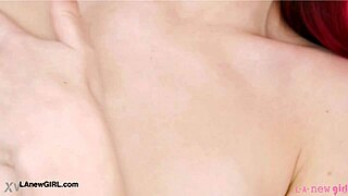 red haired model feels excited showing her sexy body during intimate photoshoot session.